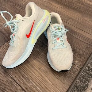 Nike Women's Athletic Shoe in Cream with Red Swoosh and Pale Blue Laces